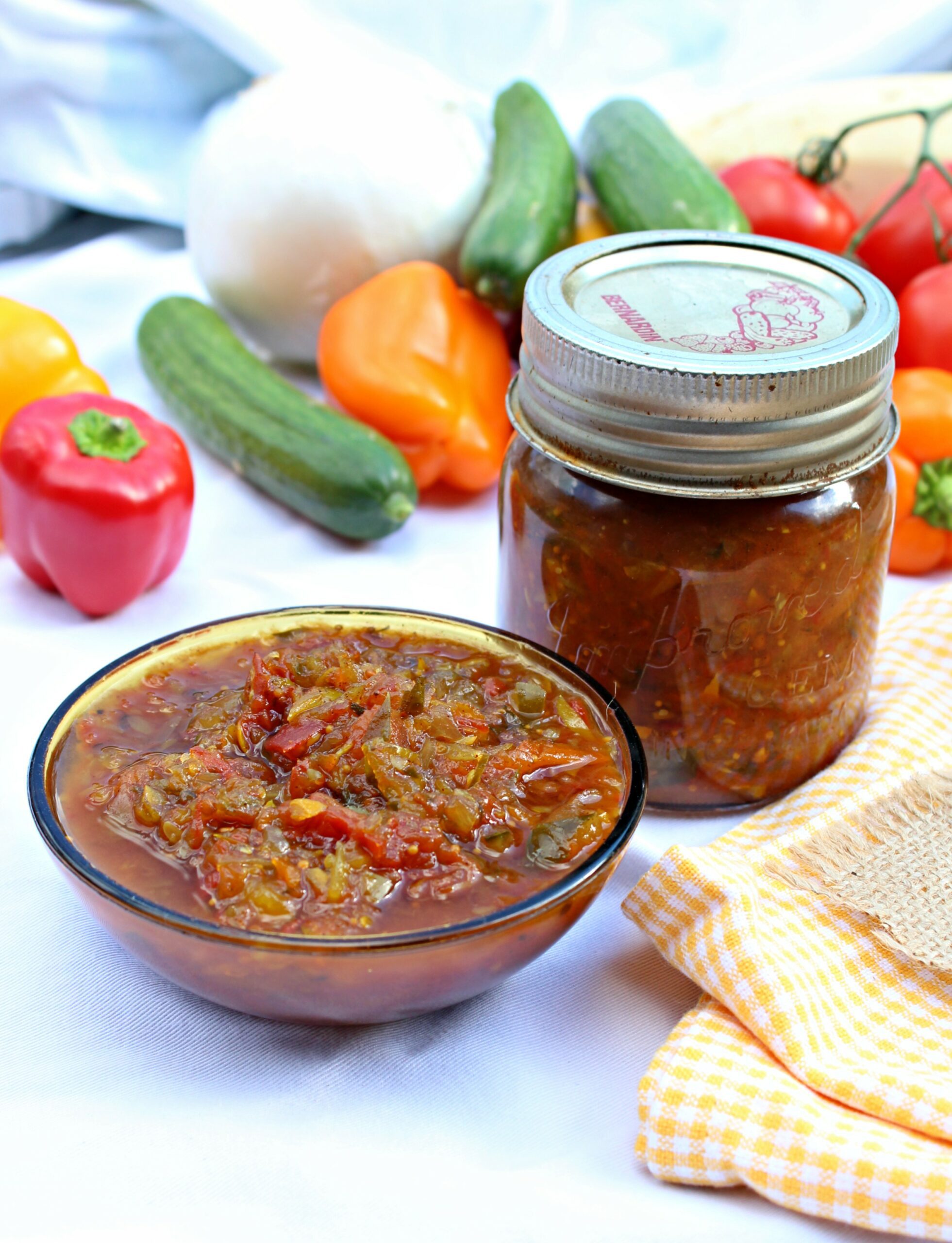 Red Hamburger relish is sweet sour and zesty! Tastes delicious on hamburgers and sausage, or any other meat. A delicious way to use your garden vegetables: cucumbers, tomatoes, zucchini, peppers, and onions. You'll come back to this easy canning recipe again and again!