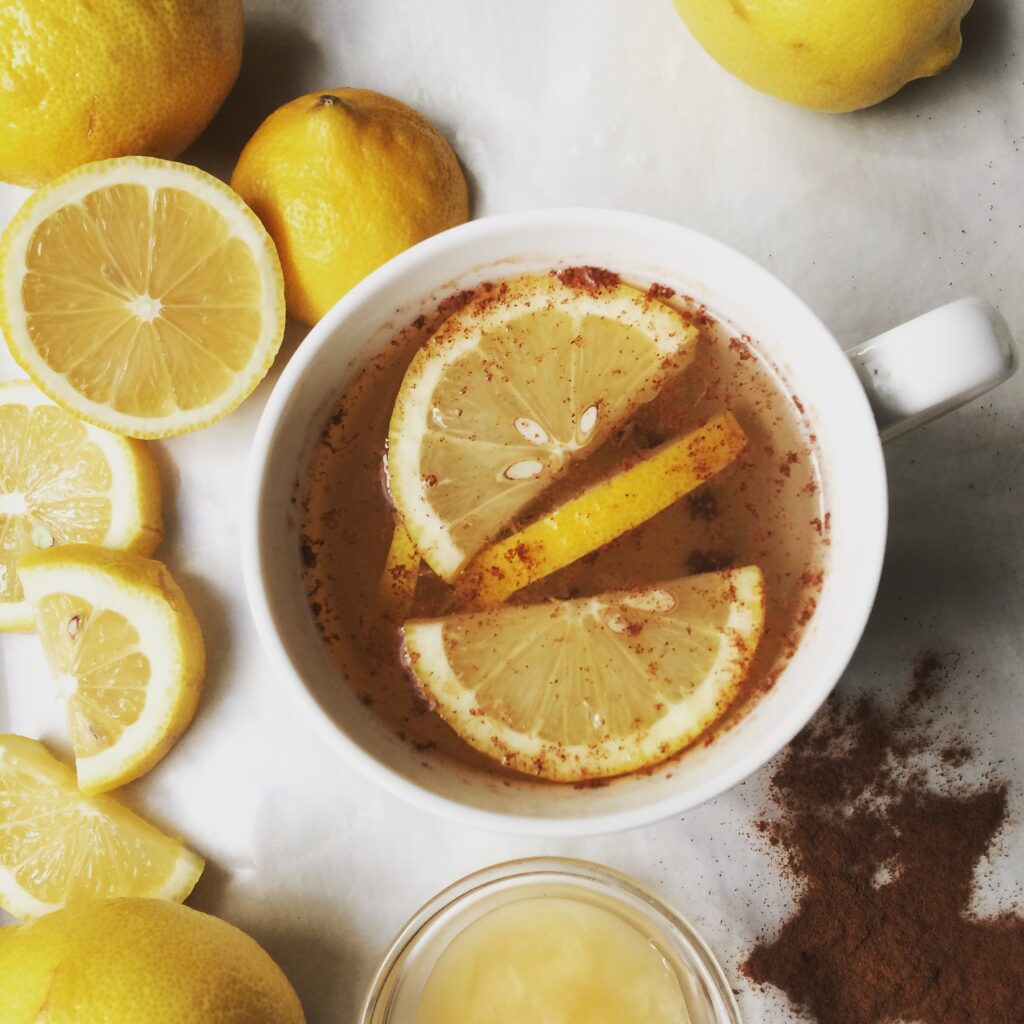 Learn how to make an easy hot toddy recipe for colds with honey, lemon, and cinnamon. It's one of the best natural remedies for coughs or sore throats. Non-alcoholic, so you can serve it to your kids and feel better in no time. #hottoddy #hottotty #cold #cough #sorethroat #naturalremedy #nonalcoholic #easyrecipe #drink #drinkrecipe