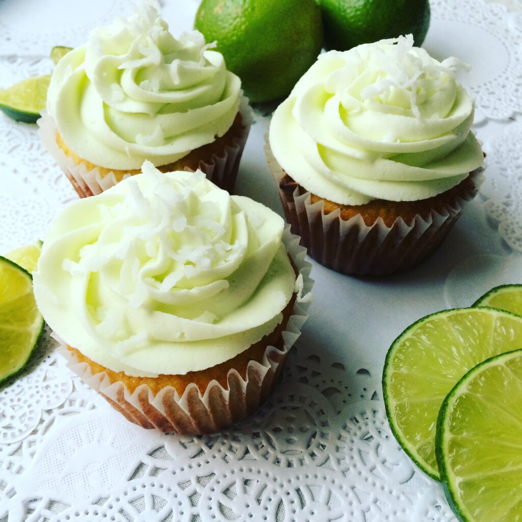 Coconut cupcakes with lime buttercream frosting.