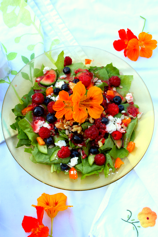 This summer salad recipe has the best of what's in season in August: raspberries, blueberries, lettuce, and cucumbers. Whip it up for lunch or dinner when you don't want to turn on 