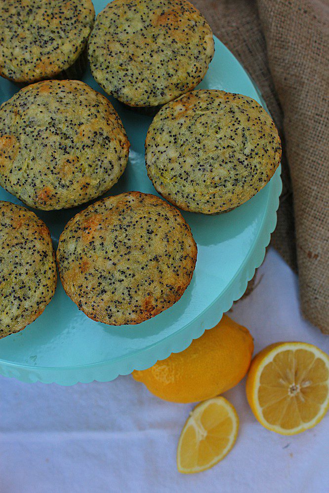 Lemon poppyseed zucchini muffins are a great way to use up all your zucchini or summer squash. Serve them for back to school lunches, snacks, or even breakfast. It's such an easy recipe that you can even make it with your kids.