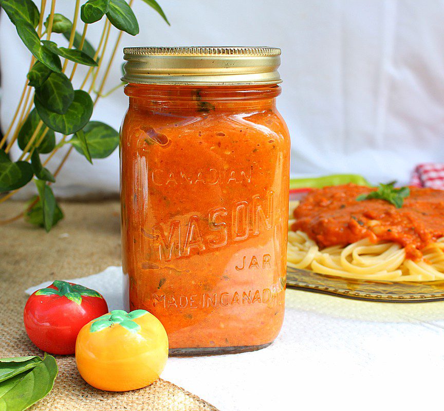 So many tomatoes and so little time! My favourite way to use garden fresh tomatoes is this homemade roasted tomato sauce. It's an easy pasta sauce recipe with fresh basil that your family will love.