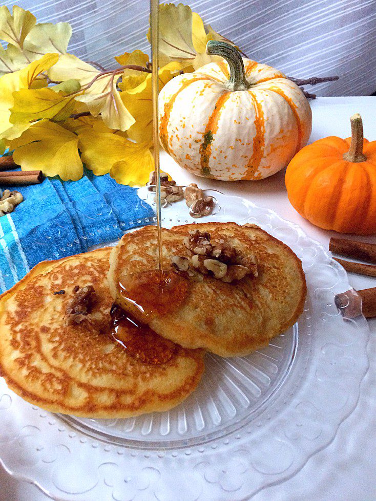 Need a quick, easy, and healthy fall breakfast? Pumpkin Spice Pancakes to the rescue. Three basic ingredients and a few spices come together to make these delicious and fluffy pancakes. You'll want to try them with walnuts and a dash of maple syrup. Thanksgiving breakfast, anyone? #breakfast #healthy #quick #easy #pancakemix #pancakes #pumpkinspice #healthybreakfast #easyrecipe #quickrecipe #recipe #brunch #thanksgiving