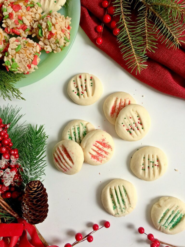 The holidays wouldn't be complete without this easy melt in your mouth shortbread recipe. Make these classic soft cookies for Christmas--Santa would approve! #christmas #cookies #shortbread #holidays #christmasbaking #holidaybaking #baking #classic