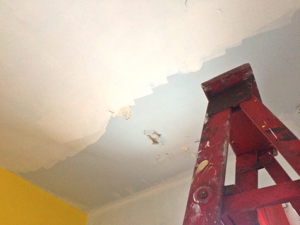 Half finished half peeling ceiling