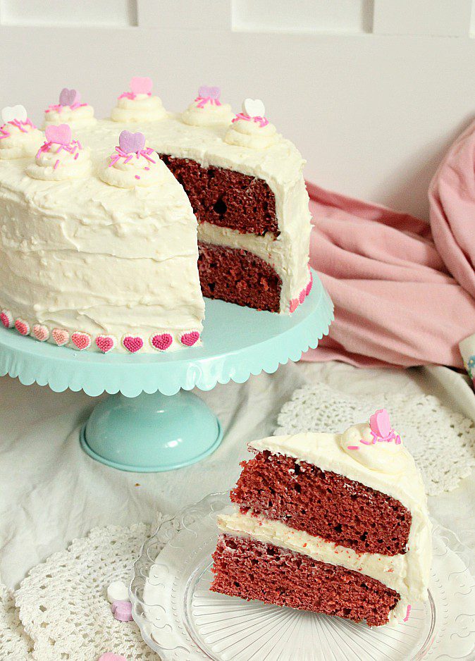 Looking for a the Goldilocks of Red Velvet cakes with cream cheese frosting?  This one is made with beets, very little food colouring, and without buttermilk.  It's an easy, from scratch recipe that's perfect for your Valentines day baking. #redvelvetcake #creamcheesefrosting #beets #fancycake #Valentinesday #baking #valentinesbaking #bakingwithbeets #bakingwithvegetables