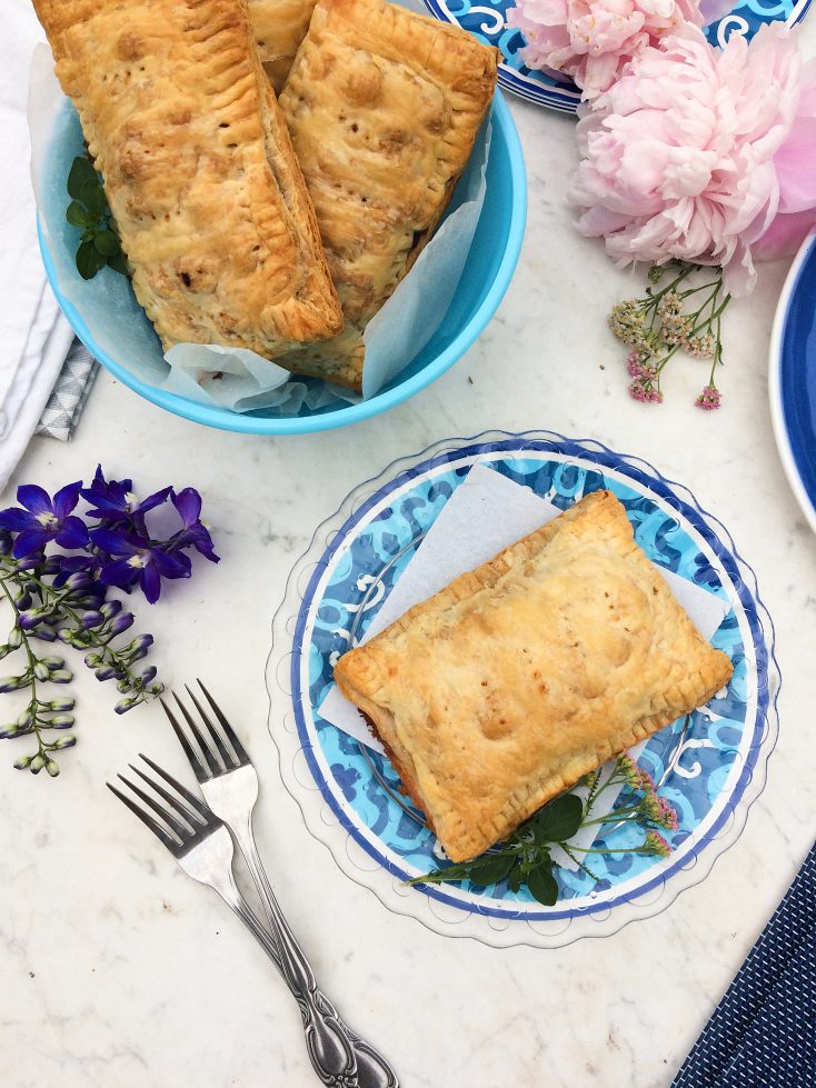 Have a few leftovers from making a Saskatoon berry pie recipe?  Don't through them out, make these easy hand pies instead. #handpies #pie #saskatoonberries #saskatoonberryrecipes #easyrecipes #dessertrecipes #summerdessertrecipe #pierecipe