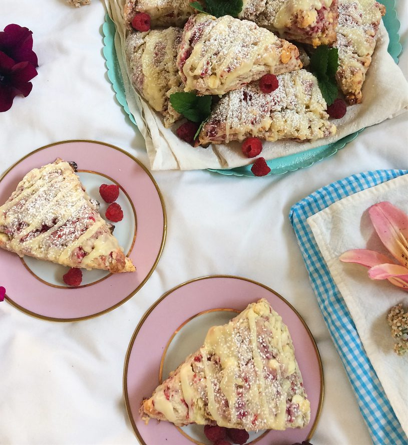 Seriously, you need these raspberry white chocolate scones in your life.  They're an easy and simple summer dessert recipe that is perfect for breakfast, dessert, or as a snack. #raspberry #whitechocolate #scone #sconerecipe #dessert #baking 