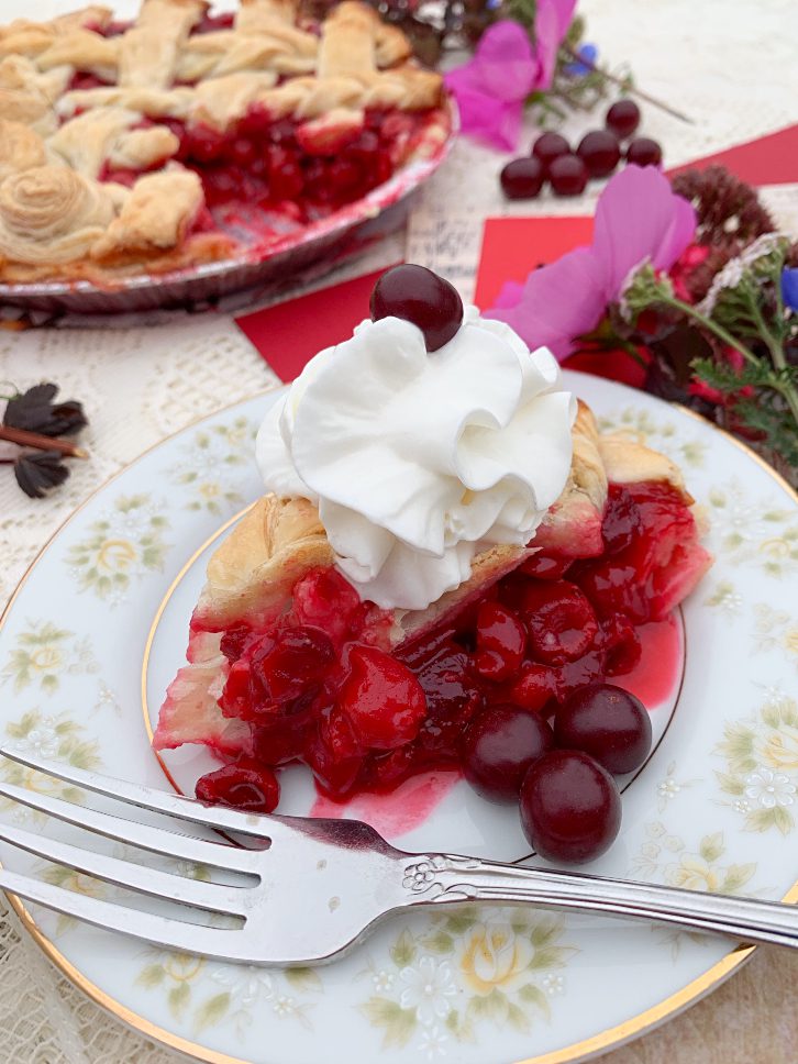 Irresistible sour cherry pie is made with an easy tart cherry pie filling and captures the fresh taste of summer!  Make this recipe with fresh or frozen cherries.  Pre-made pies also freeze well. #sourcherries #tartcherries #pie #filling #recipe